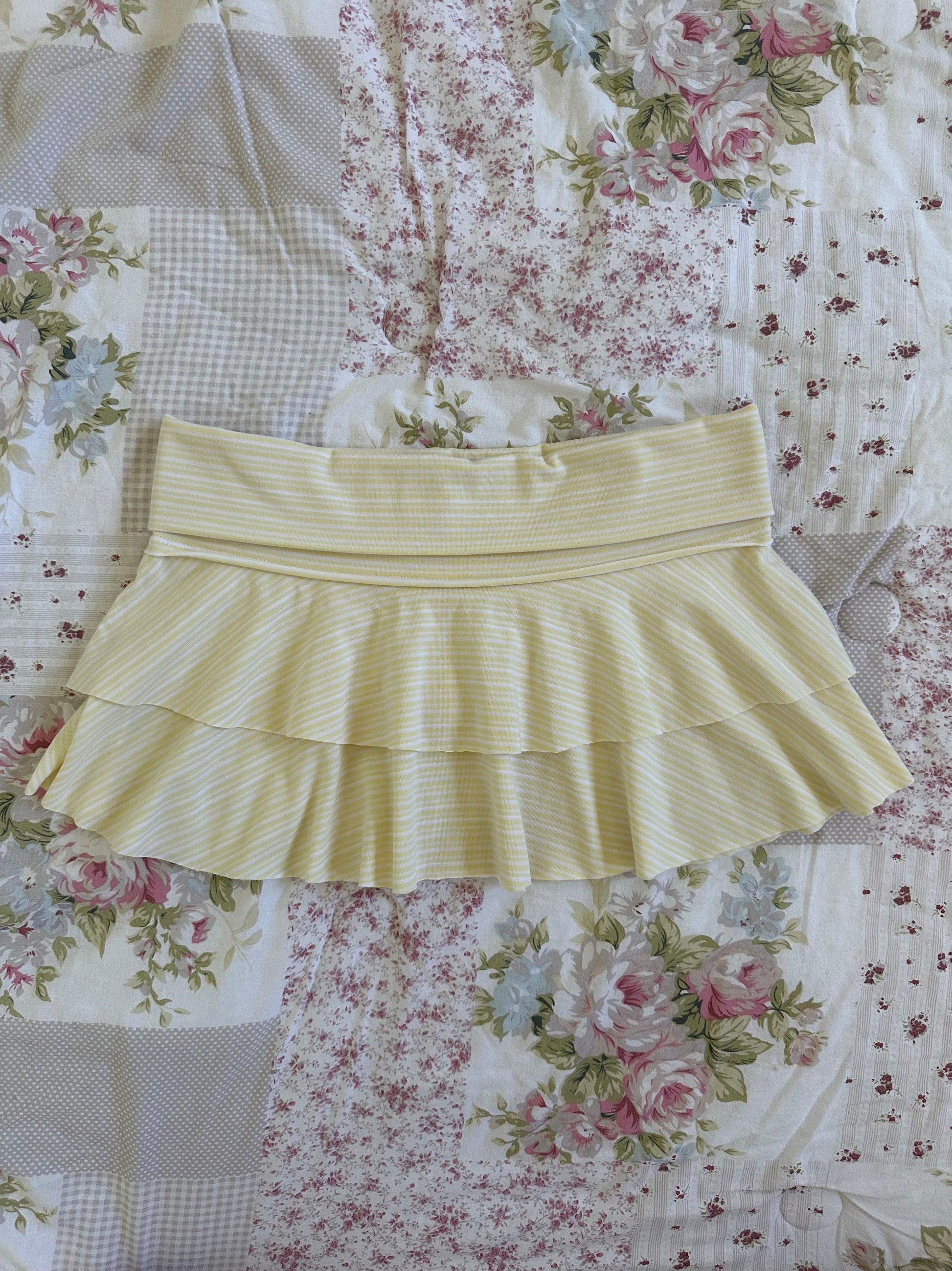 Yellow fold over mini skirt